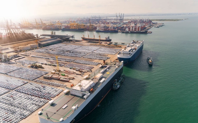aerial-view-of-large-vessels-conveing-cars-and-trucks-for-export.cdn