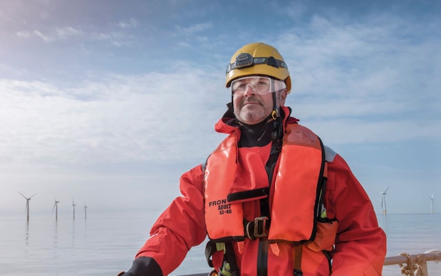 engineer-inspecting-offshore-windfarm.cdn